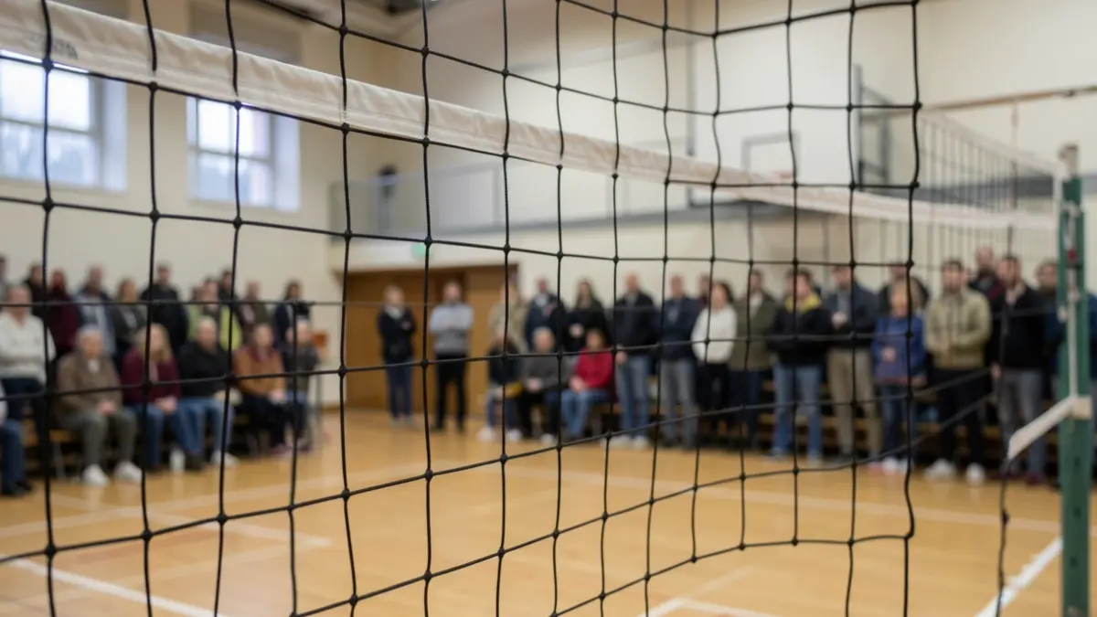Generic image of a volleyball net in a gymnasium.